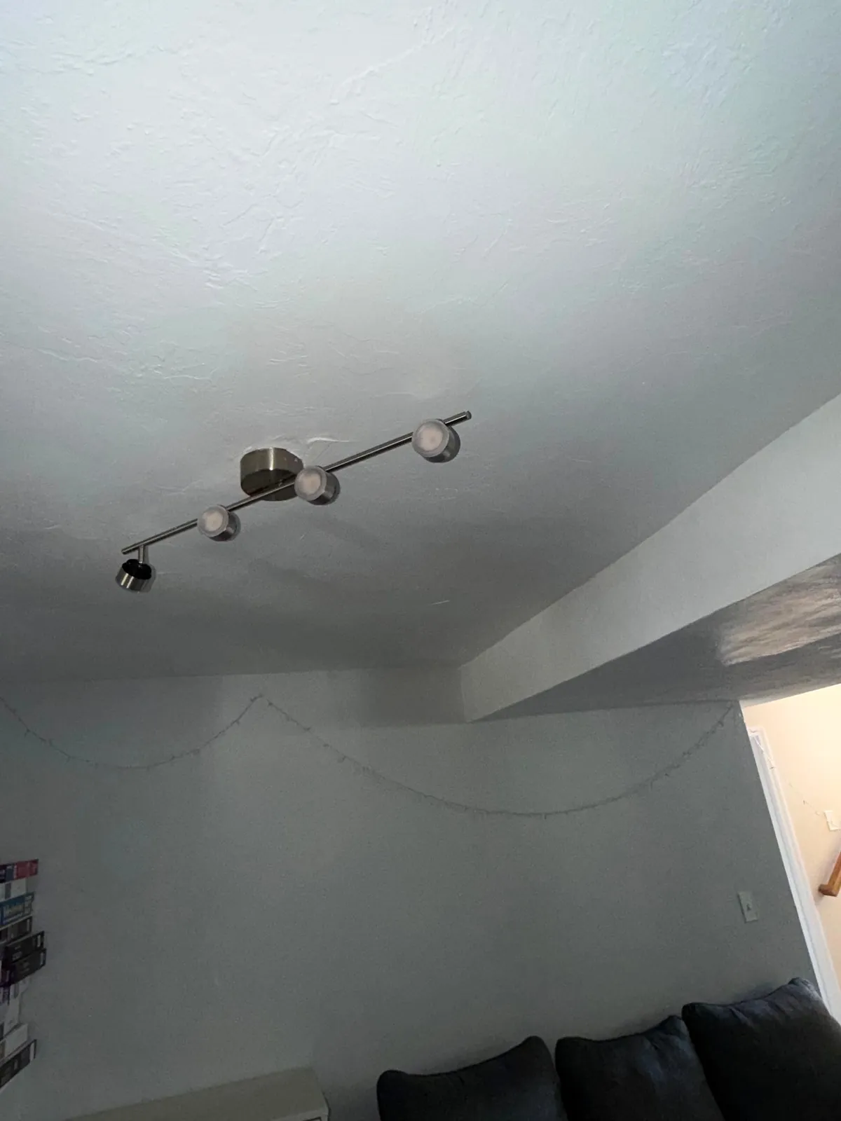Smooth, freshly painted ceiling after repair