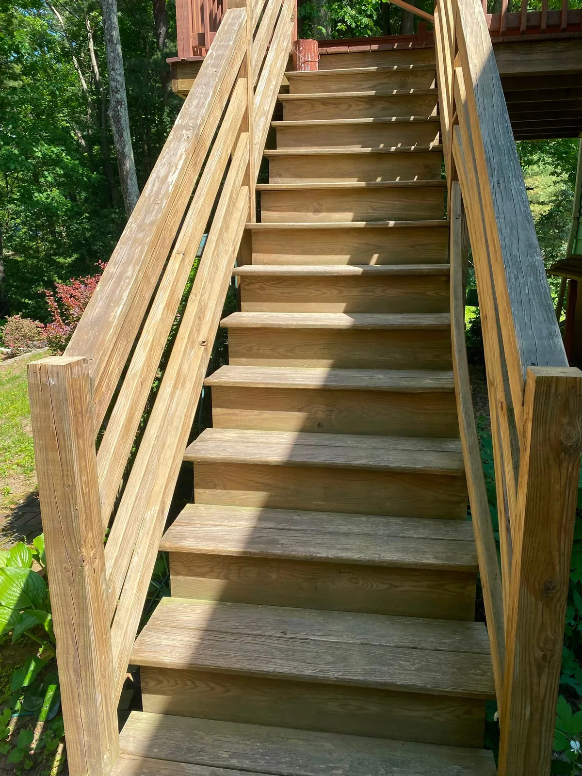 Weathered deck stairs before